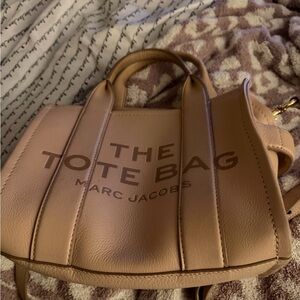 Marc Jacobs light pink small Leather Tote. The tote bag, small purse.